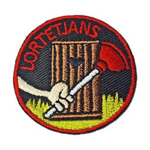 Hjælpermærket (Lortetjans) spejdermærke