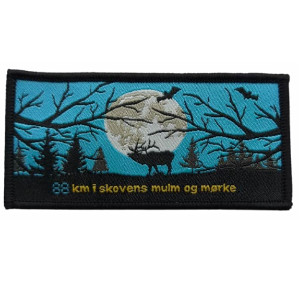 I skovens mulm og mørke spejdermærke